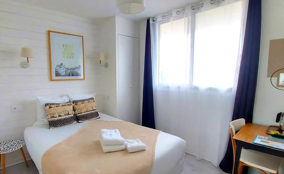 Hotel La Croisette & Restaurant Bistrot Gantier En Centre Ville รัวย็อง ภายนอก รูปภาพ
